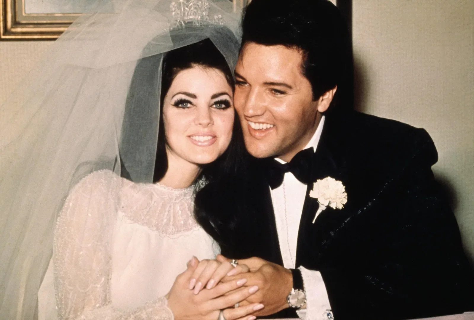 Elvis and Priscilla Presley smiling cheek to cheek following their wedding on May 1, 1967, in Las Vegas, Nevada