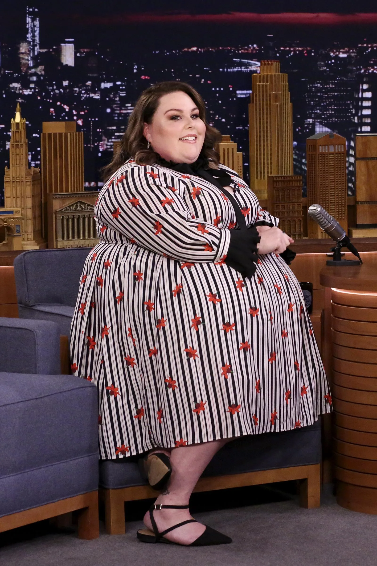 Metz chose a black-and-white striped dress with red floral accents for "The Tonight Show Starring Jimmy Fallon." The photo shows her appearance several years before she began publicly discussing major changes to her health routine.