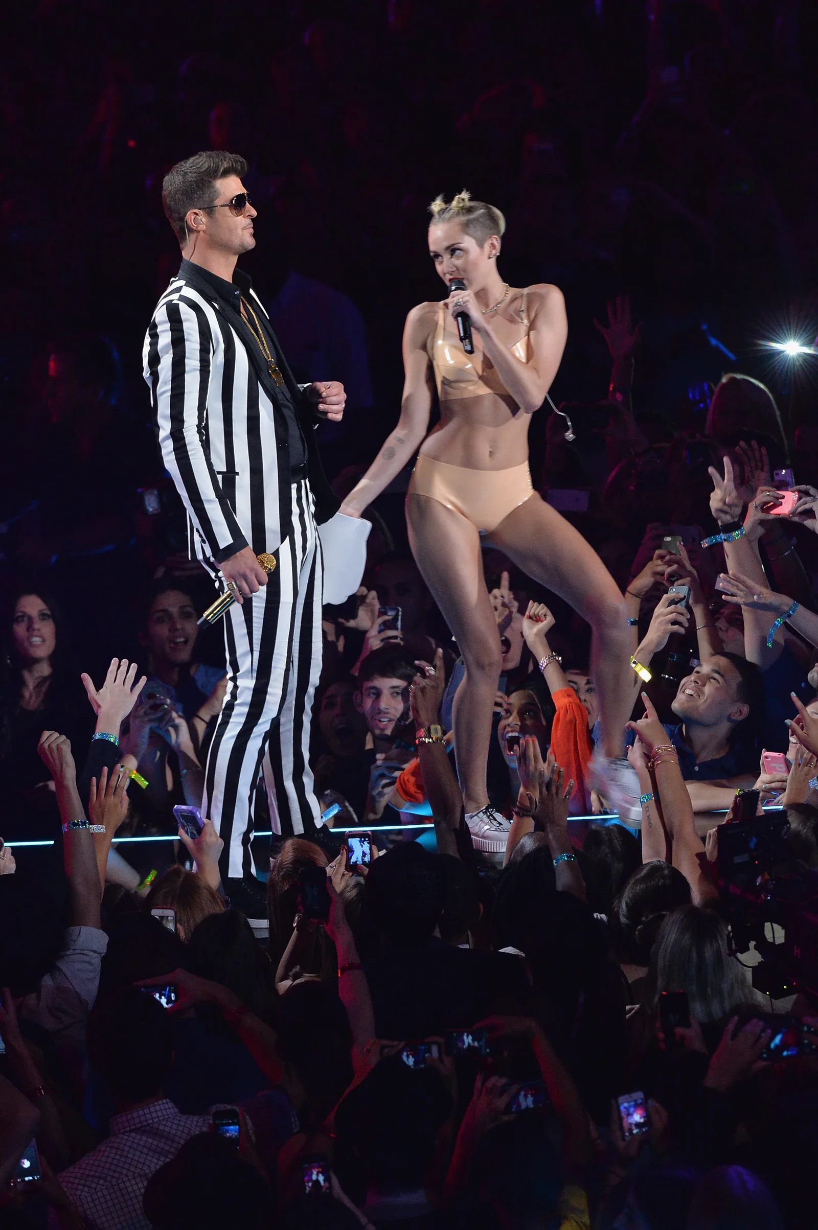 August 25, 2013 became one of the most consequential days of Miley's career, with "Wrecking Ball" arriving as her image was undergoing a dramatic transformation. Her now-infamous MTV VMA performance with Robin Thicke that same night sparked enormous backlash — and even bigger attention.