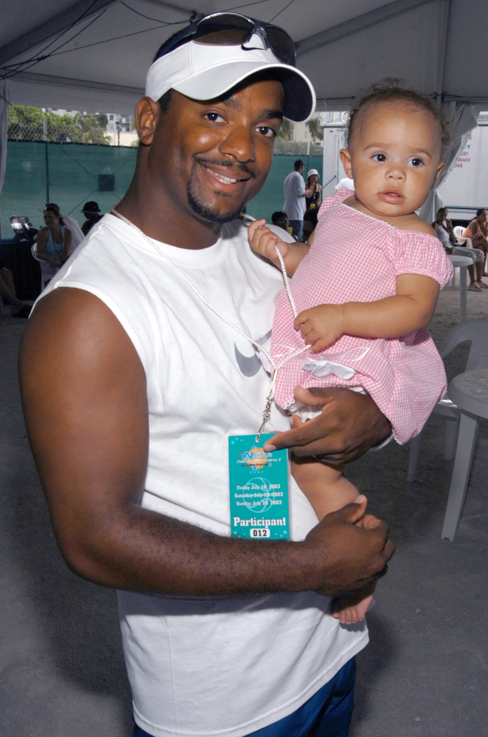 Alfonso Ribeiro and daughter Sienna during *NSYNC's Challenge for the Children V - Celebrity Skills Challenge - Backstage at Collins Park in Miami Beach, Florida, on July 19, 2003