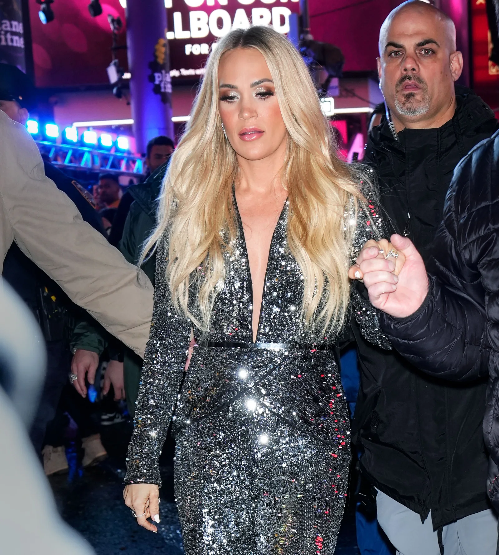 Underwood made her way through New York on New Year's Eve in a sequined silver outfit before the celebrations. Street-style photos offered another glimpse of the singer during a busy period of public appearances.