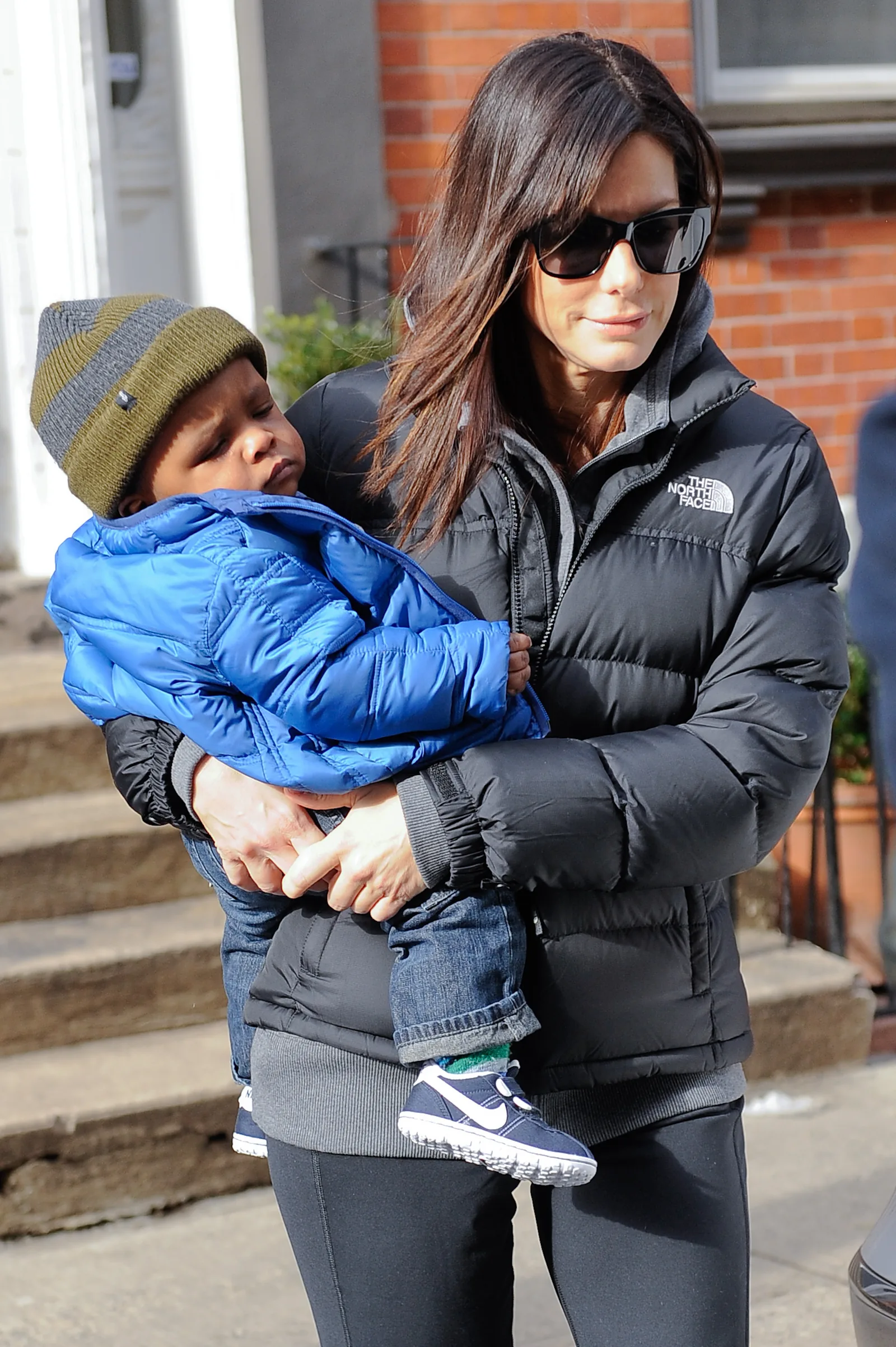 Sandra Bullock and Louis Bullock pictured leaving their Soho home on January 20, 2011 in New York City