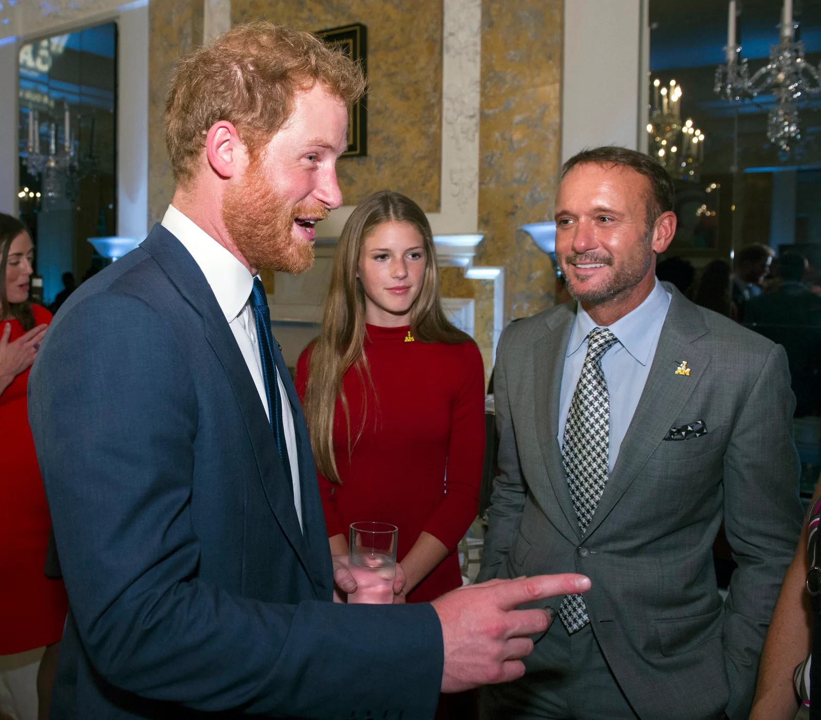 Maggie McGraw attends an Invictus Games reception with her father, Tim McGraw, in 2015. She later chose a career in public service, earning a master's degree and working on Capitol Hill.