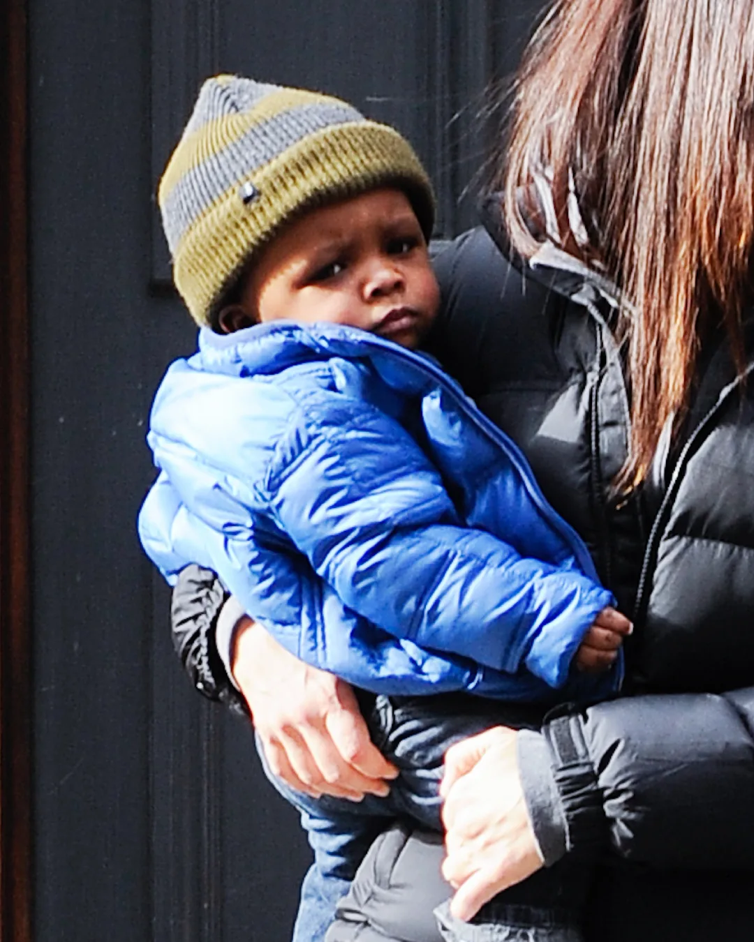 Louis Bardo being held by his mom as the duo step out in New York City on January 20, 2011.