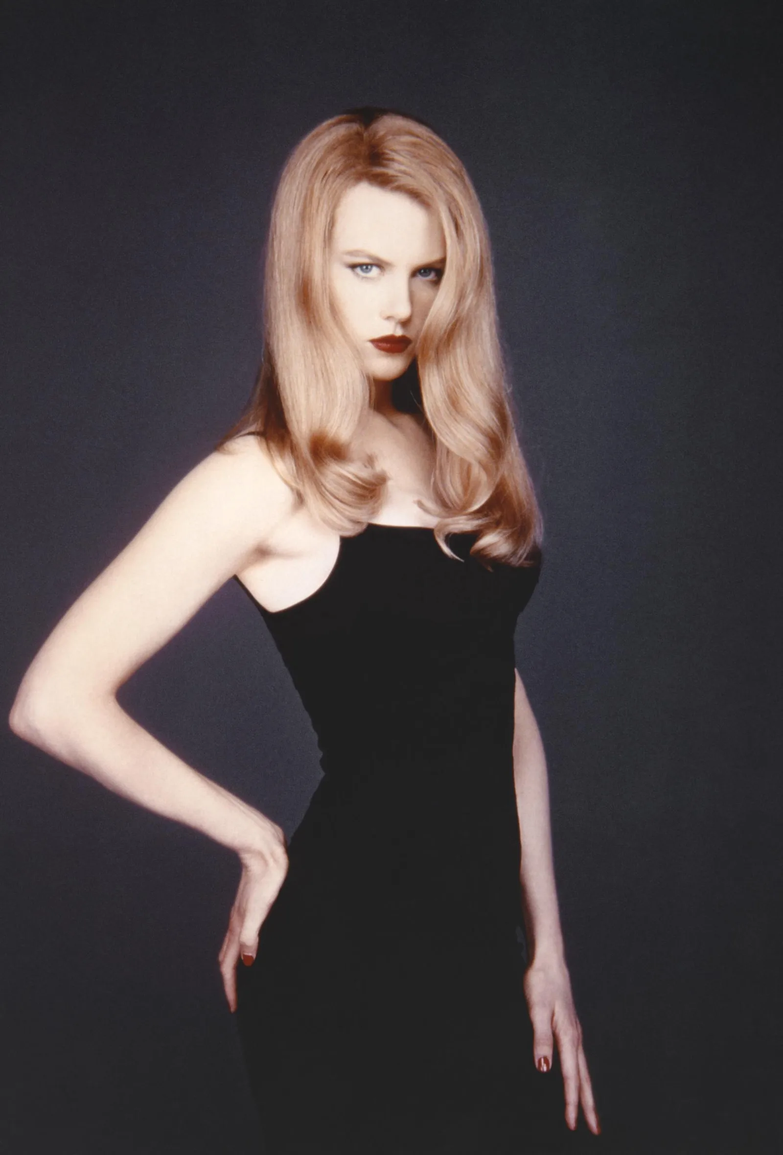 Kidman experimented dramatically with hair and styling even early in her career, something she has since said she enjoys doing for her screen transformations. Her appearance was never completely fixed to a single signature look.