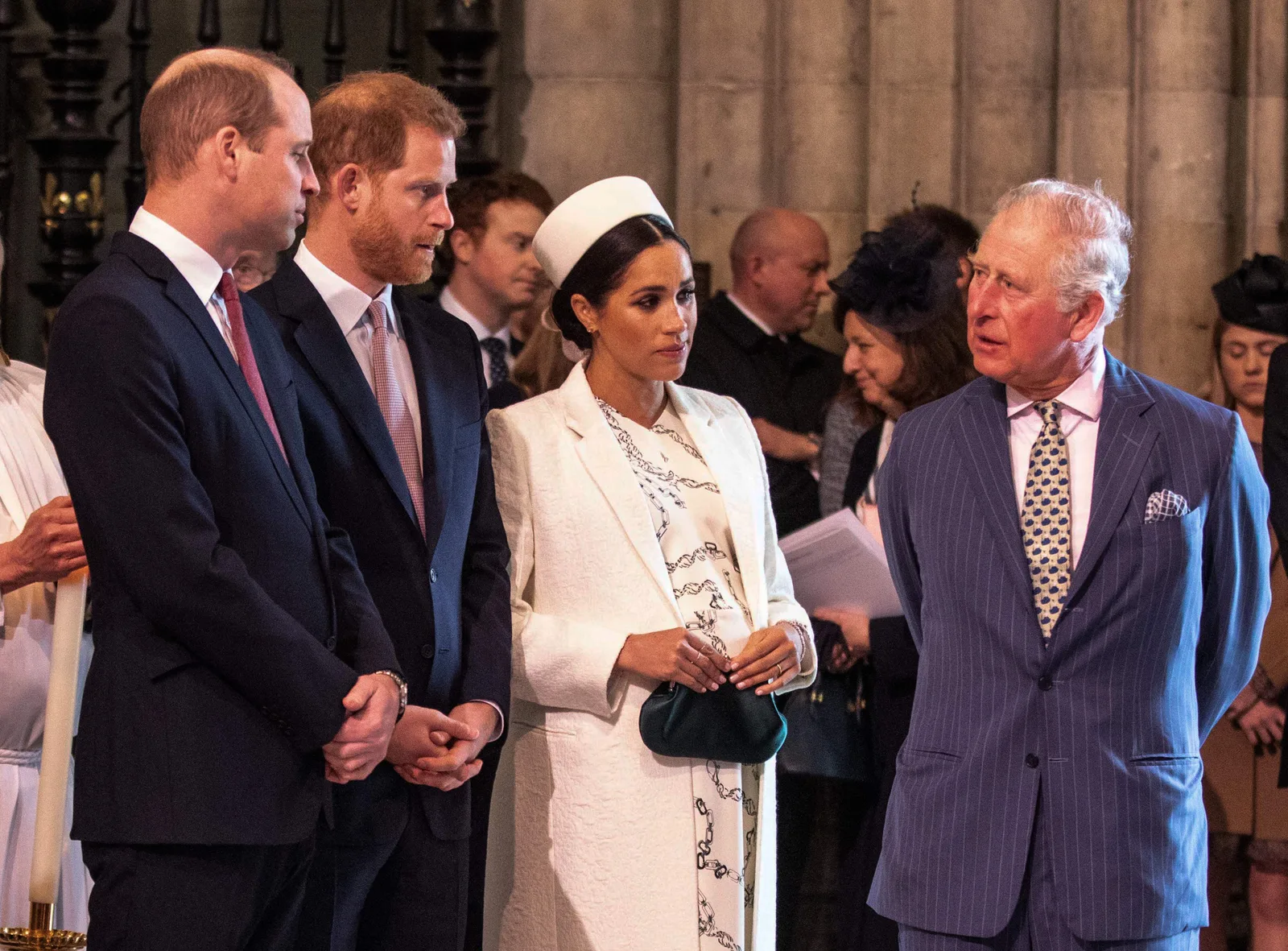 Prince William, Prince Harry, Meghan Markle, Duchess of Sussex, talk  with King Charles III as they attend the Commonwealth Day service on March 11, 2019 in Westminster Abbey, London