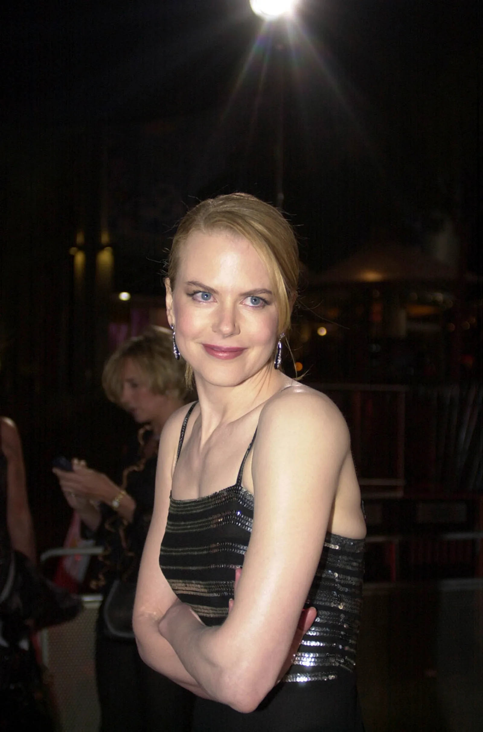 By the 2000s, Kidman's styling had shifted considerably from the curls associated with her earlier years. The decade shows the beginning of the sleek, polished presentation that later became familiar on major red carpets.