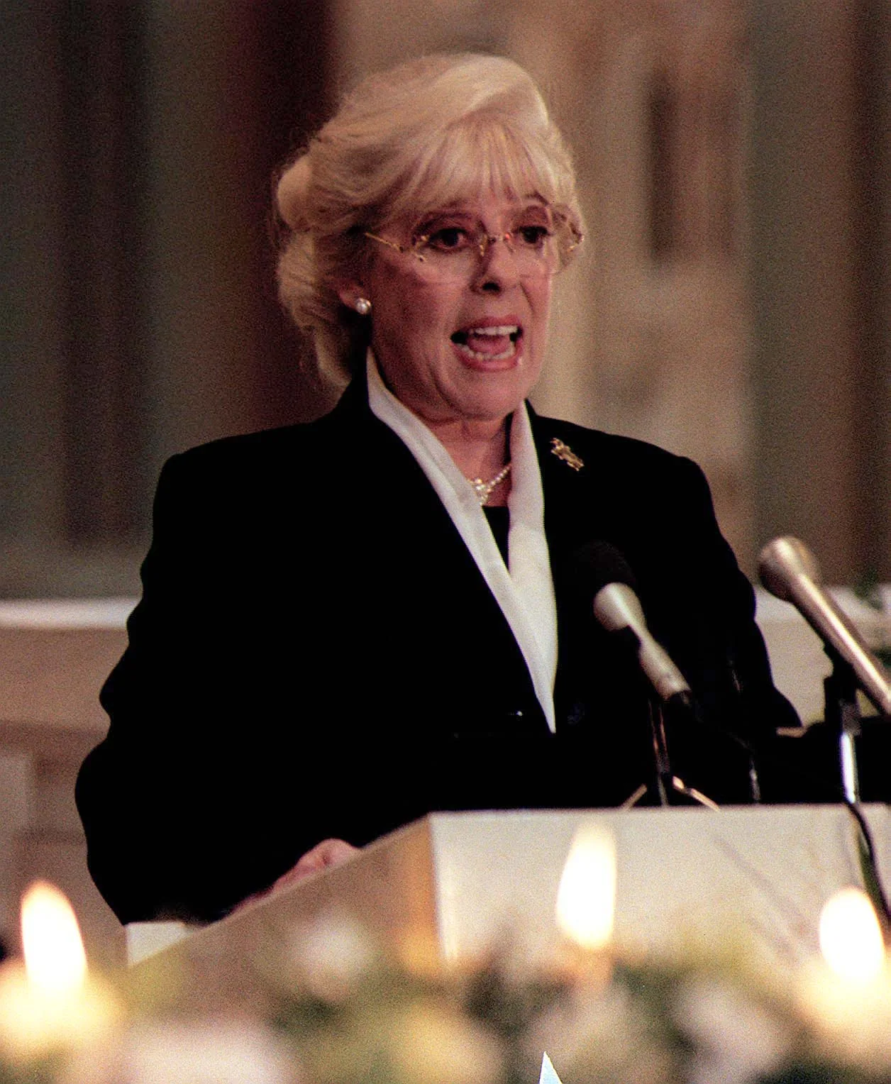 The actress speaking at Salford's Roman Catholic cathedral on April 13, 1999