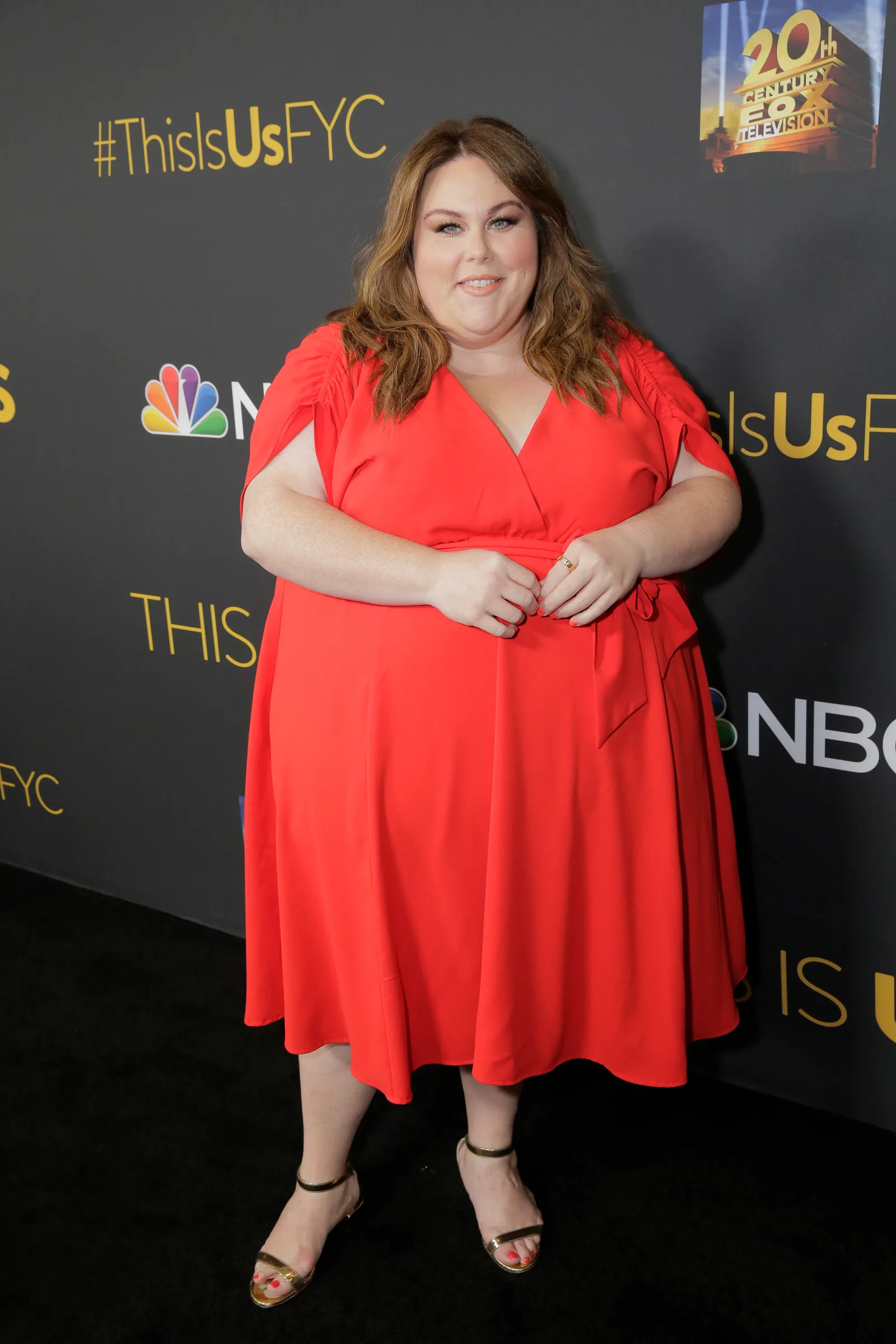 She wore a bright red wrap-style dress to a "This Is Us" FYC event. By then, Metz was making regular appearances tied to the series that had made her widely known.