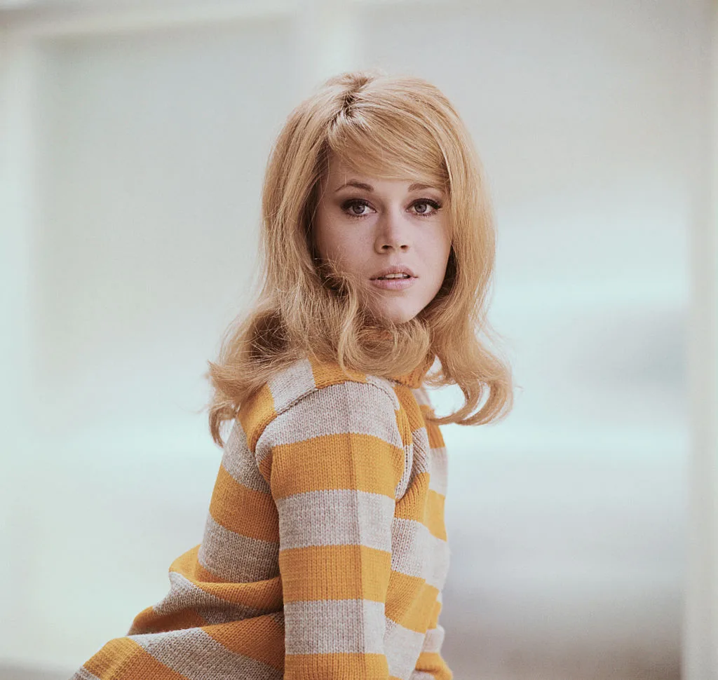 Jane Fonda appears in a striped sweater during a portrait session in the early years of her film career.