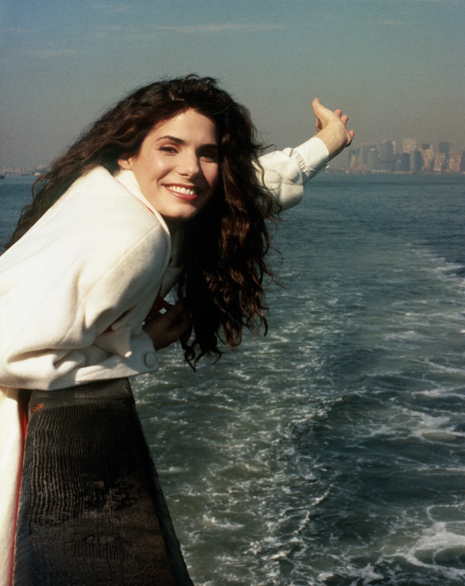 Bullock's 1990s photographs capture the familiar smile that would become one of her most recognizable features. That history helps explain why some fans concentrated so heavily on her mouth and teeth in the latest images.