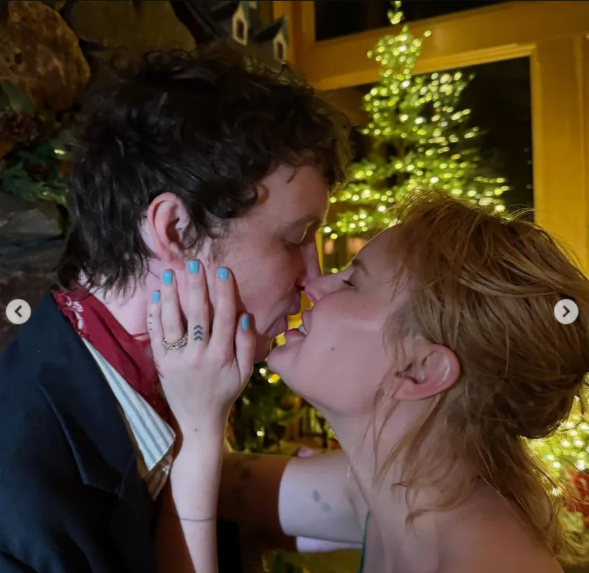Tallulah and Justin Acee shared a kiss in front of a glowing Christmas tree in an intimate photo from their relationship, years before they exchanged vows in Sun Valley.