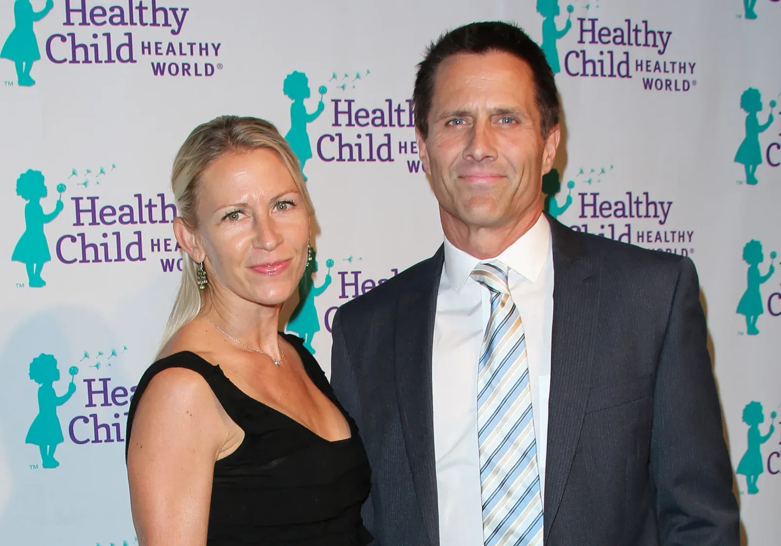 Erin Bolte and her husband attend the Healthy Child Healthy World's Mom On A Mission 6th annual awards on October 29, 2014