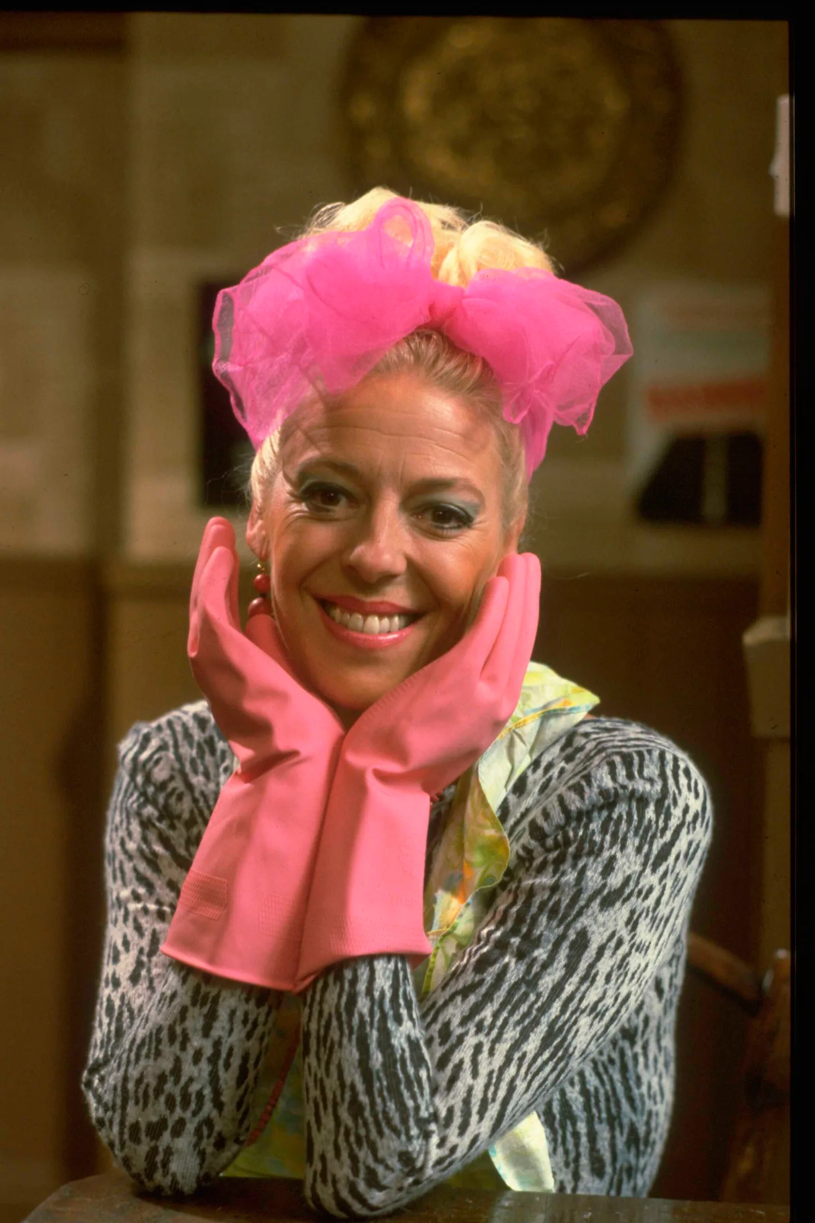 The public figure poses on the set of "Coronation Street," 1984
