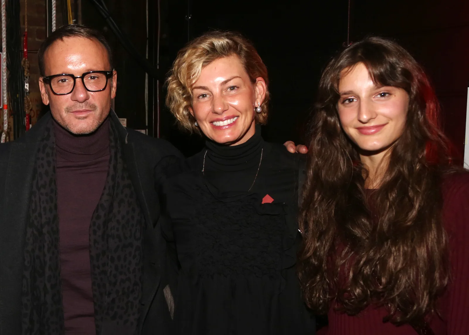 Tim McGraw, Faith Hill, and Audrey McGraw pose backstage at Moulin Rouge! The Musical in New York City in 2020. As Audrey's music career flourished, her parents continued to champion her talent—before her relationship with actor Manuel Garcia-Rulfo also began attracting public attention.