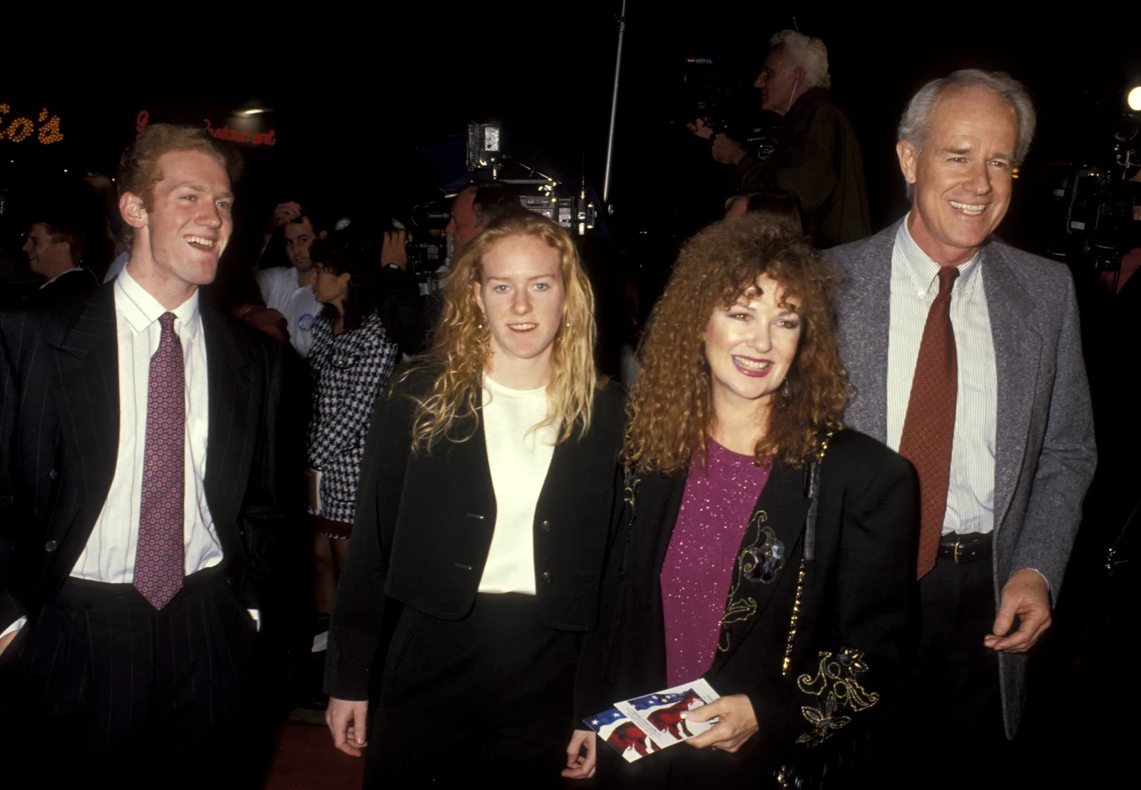 Shelley Fabares and Mike Farrell pose with Farrell's children Michael, and Erin, during the "JFK" world premiere on December 17, 1991, at Mann's Village Theater in Westwood, California