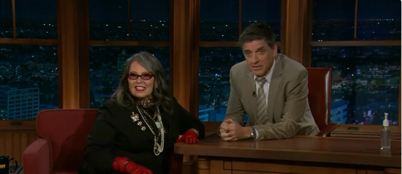 Roseanne Barr appeared alongside Craig Ferguson on The Late Late Show with Craig Ferguson in January 2011, where she discussed Dolly Parton's tattoos and described them as pastel-colored designs featuring bows rather than traditional dark ink. Barr's comments added to the long-running curiosity surrounding the body art Parton had largely kept out of public view.