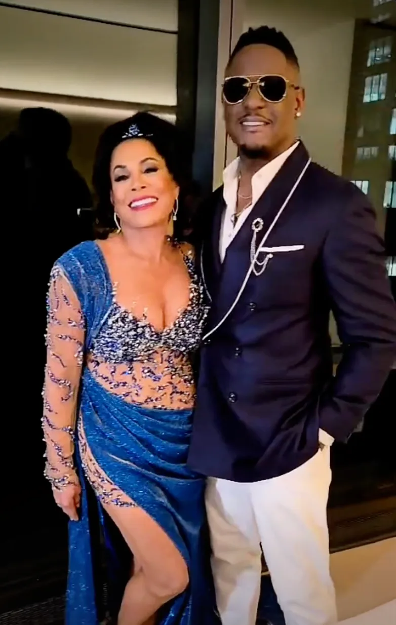 Josie Hart and Blair Underwood smile for a photo, posted in 2025.