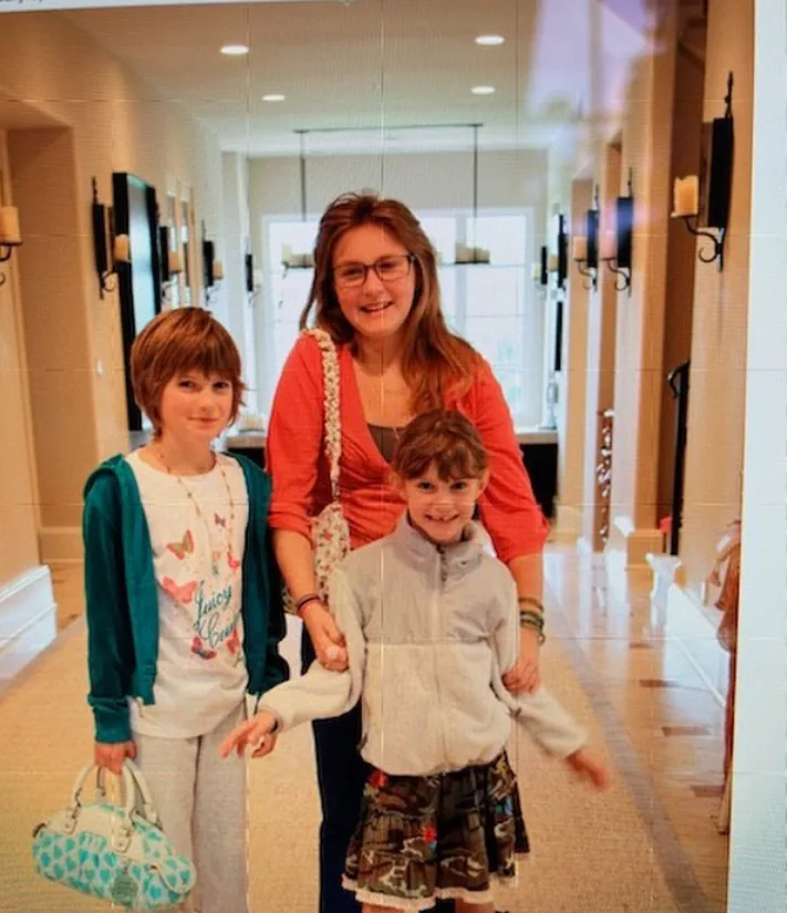 Maggie, Gracie, and Audrey McGraw pose together in a childhood photo. Despite following very different paths as adults, the three sisters have remained close over the years, continuing to support one another through every stage of life.
