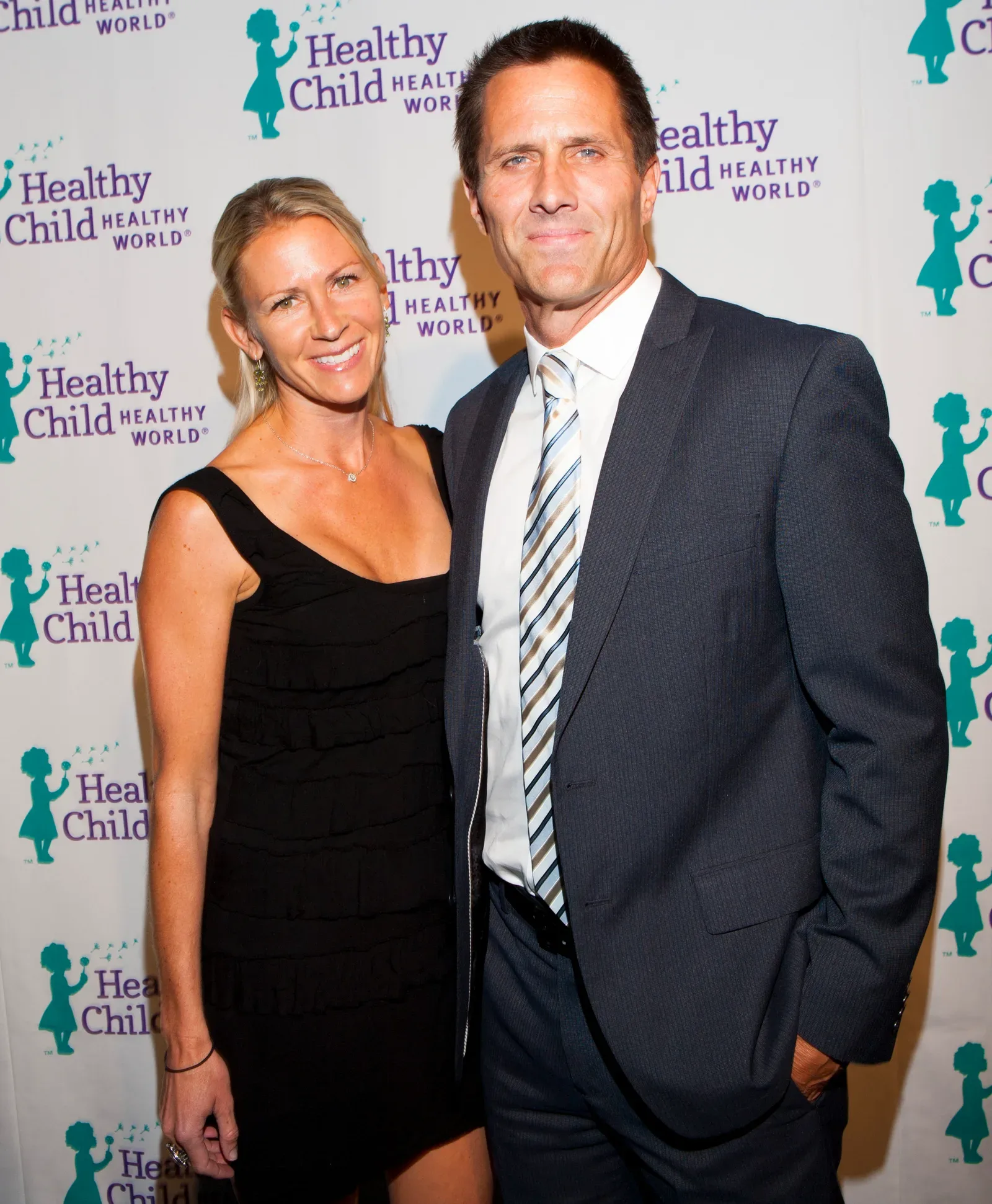 Erin Bolte and her husband attend the Healthy Child Healthy World's Mom On A Mission 6th annual awards on October 29, 2014