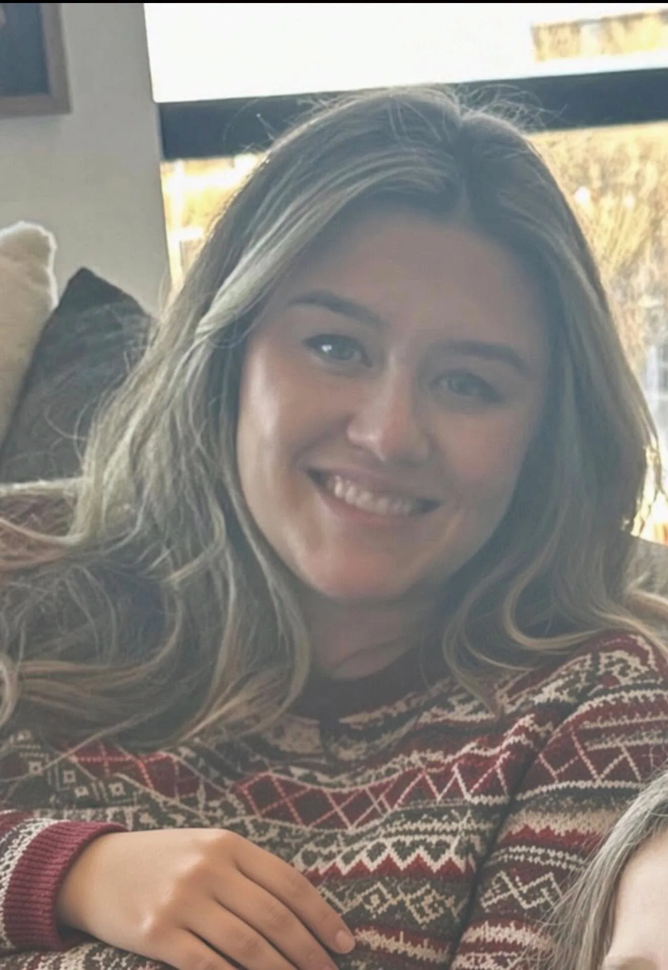Corie Walsh, pictured in a family photo before her arrest.