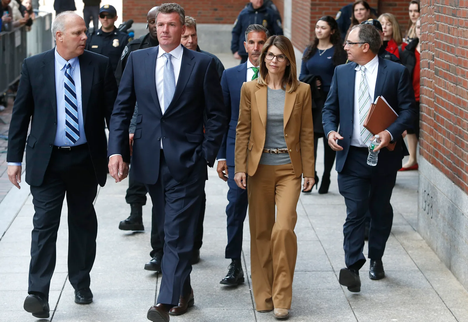 Lori Loughlin and Mossimo Giannulli faced mounting legal pressure as they arrived for their first court appearance in connection with the nationwide college admissions bribery scandal. In this photo, they departed John Joseph Moakley United States Courthouse on April 3, 2019, in Boston, Massachusetts.